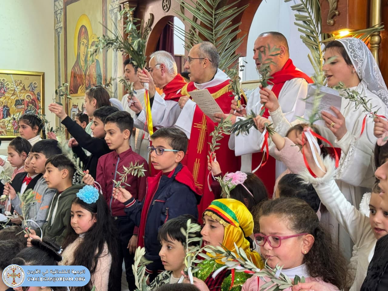 عيد السعانين لرعيتنا الكلدانية في كنيسة الروم الكاثوليك/ الهاشمي الشمالي.  الأحد ٢٠٢٦/٤/٤